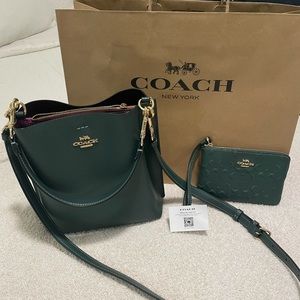 Coach Bucket Bag in green with a small matching wallet